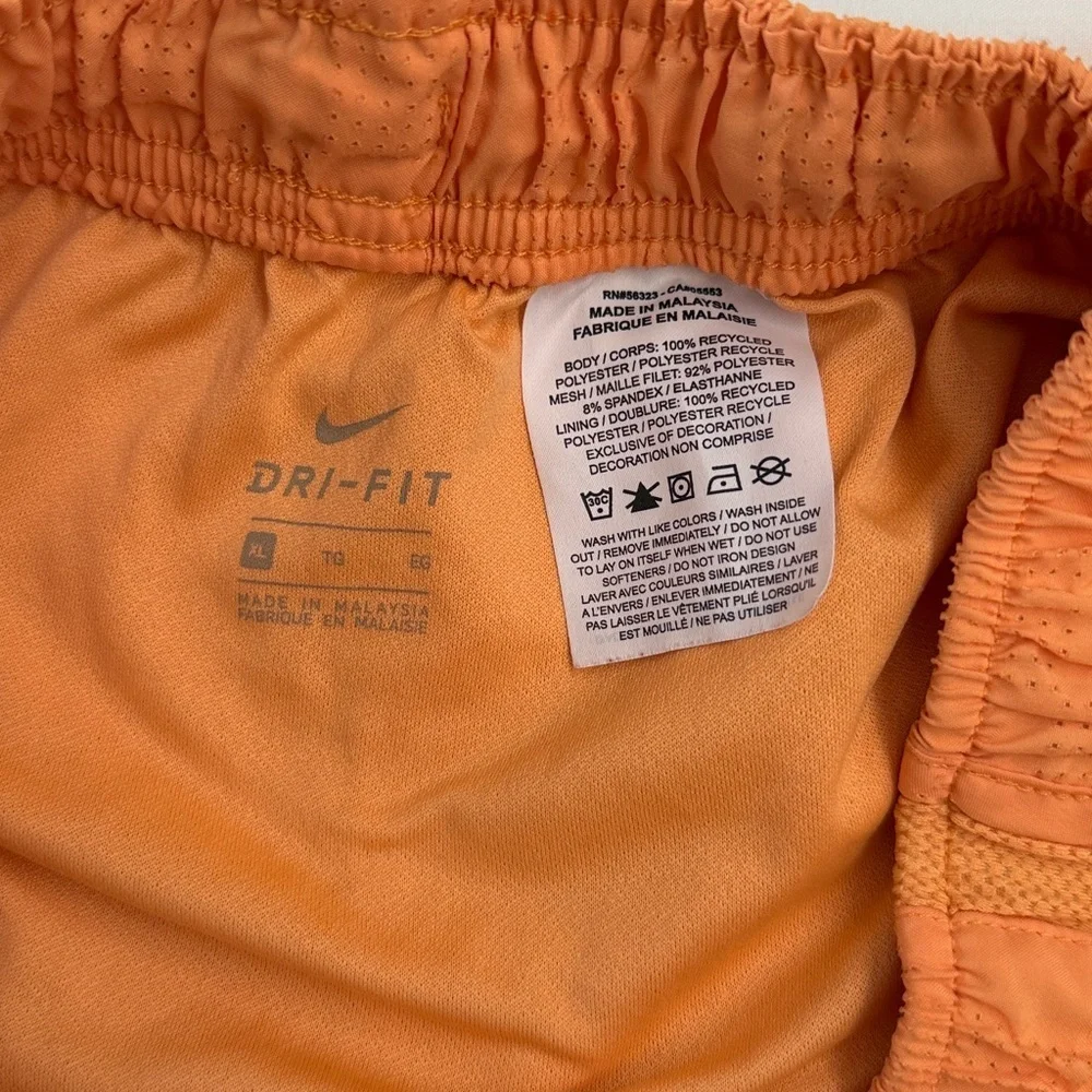 Nike Women's Vibrant Orange Athletic Shorts
